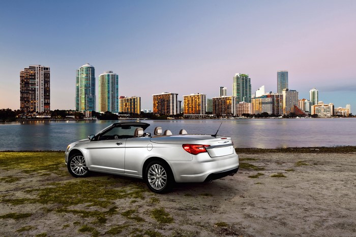 Silver 2011 Chrysler 200 Convertible by the water
