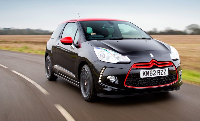Black and Red Citroen DS3 Driving on a Road