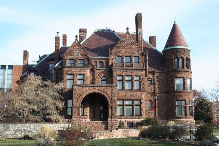 Stone Mansion with Turret and Arched Entrance