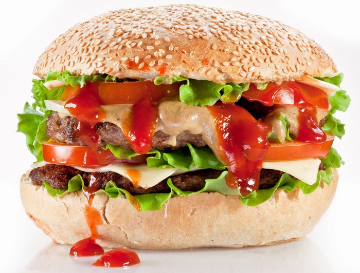 Double cheeseburger with ketchup and lettuce