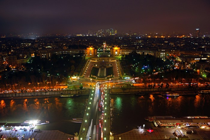 Night view of Paris from above with Seine River and bridge