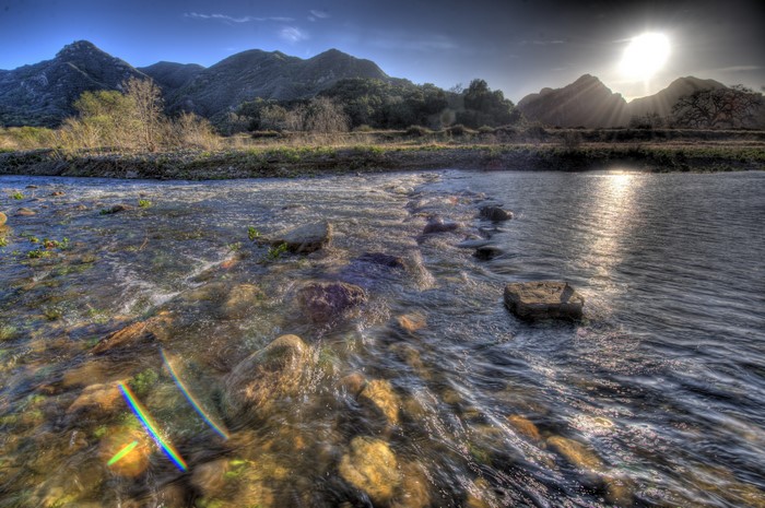River with stepping stones and mountains in Malibu, California