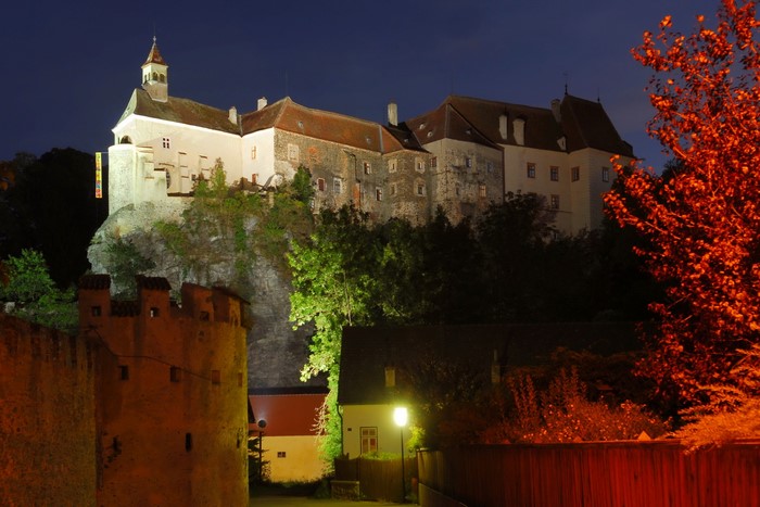 Castle illuminated at night in Austria