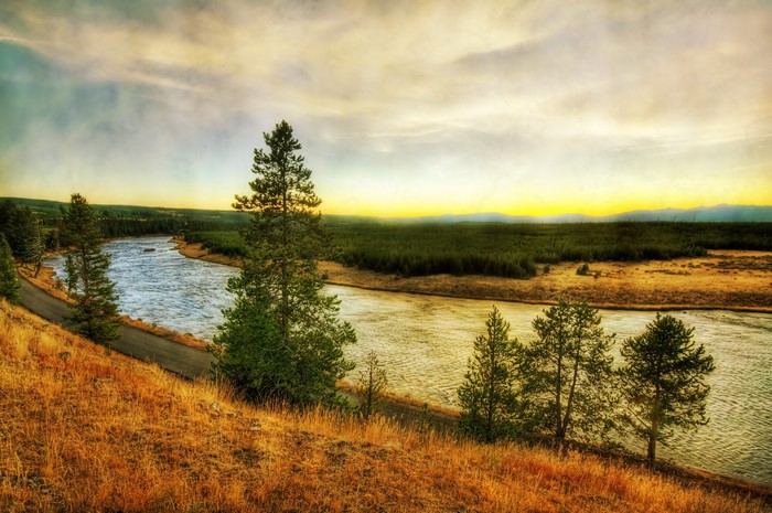 River flowing through Yellowstone National Park at sunset