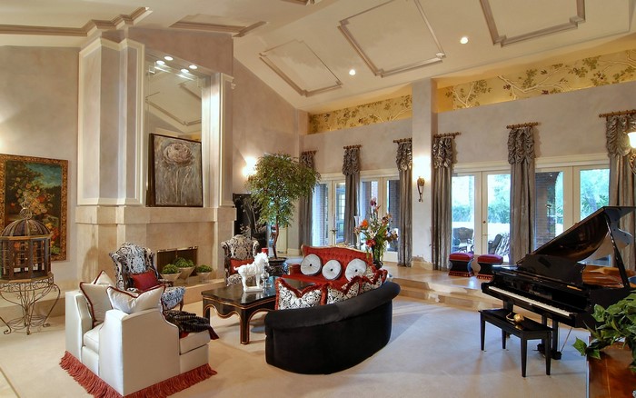 Luxurious living room with grand piano and fireplace