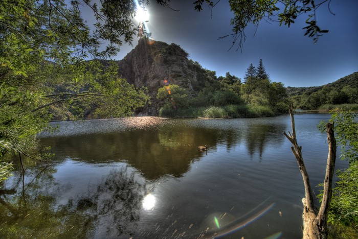 Lake with Rocky Hill and Trees in Malibu, California
