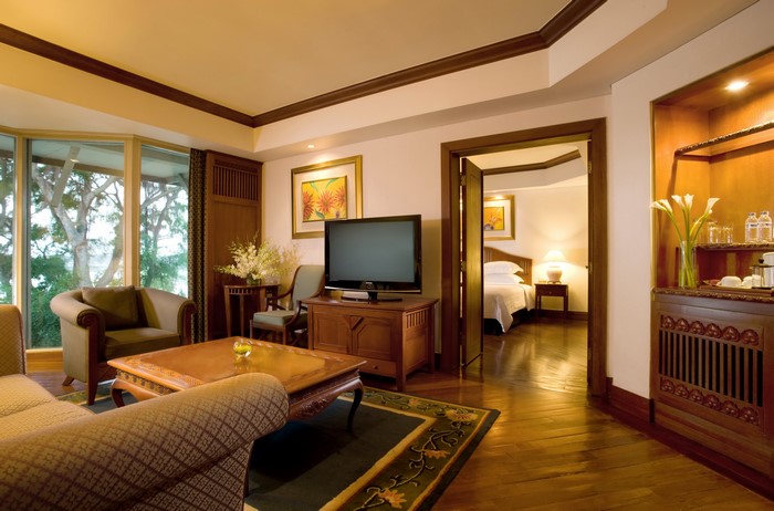 Luxury hotel suite living room and bedroom