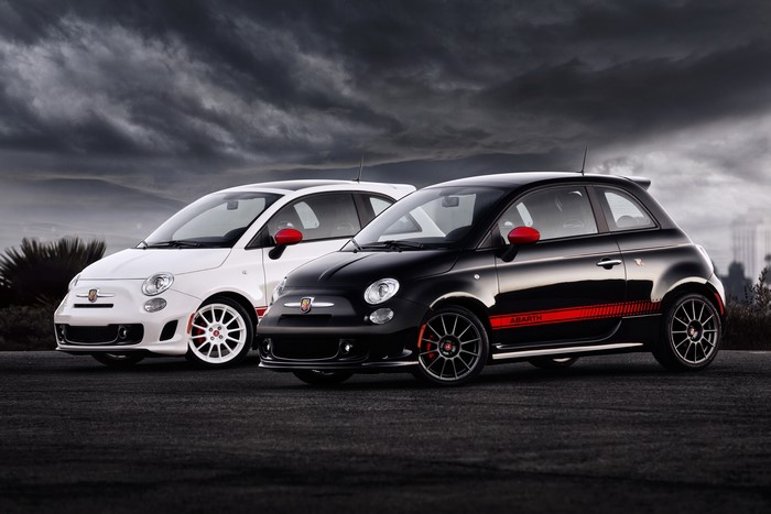 Two Abarth 500 cars, one black and one white