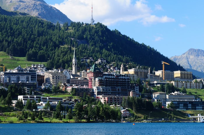 Town on a mountainside overlooking a lake in Switzerland