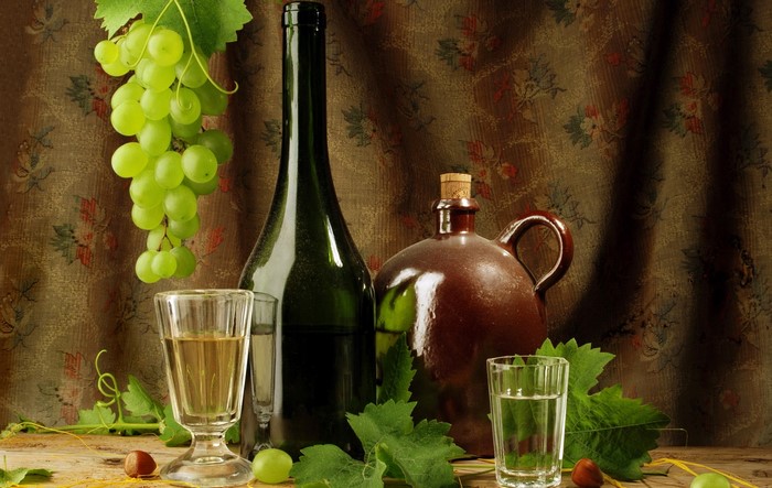 Still life with wine, grapes, and jugs