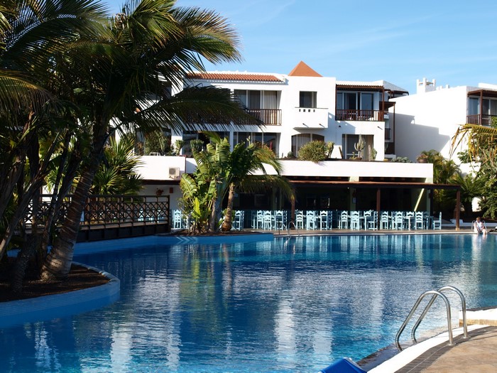 Resort with pool and palm trees in the Canary Islands, Spain