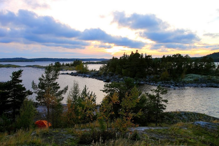 Camping by the lake at sunset in Karelia, Russia