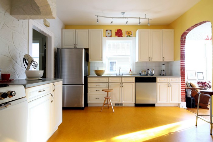 Kitchen with yellow walls and floor