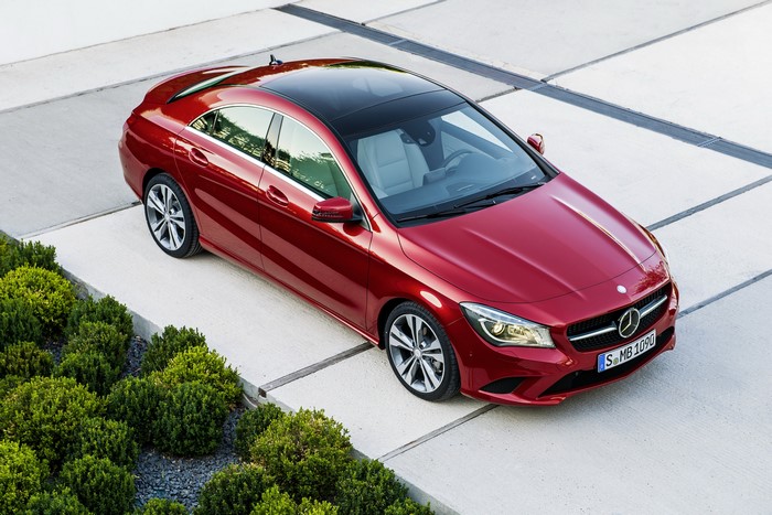 Red Mercedes-Benz CLA220 CDI parked on concrete