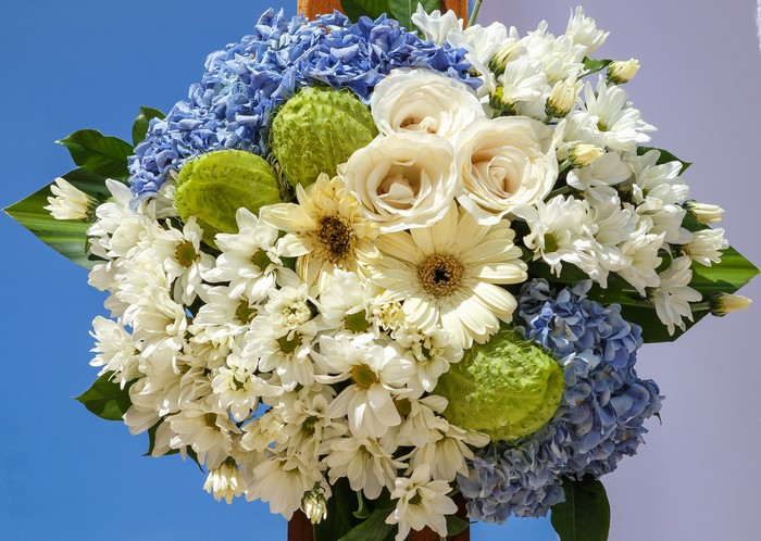 Bouquet of flowers with blue hydrangeas and white roses