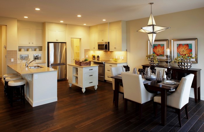 Modern kitchen and dining area with island and table
