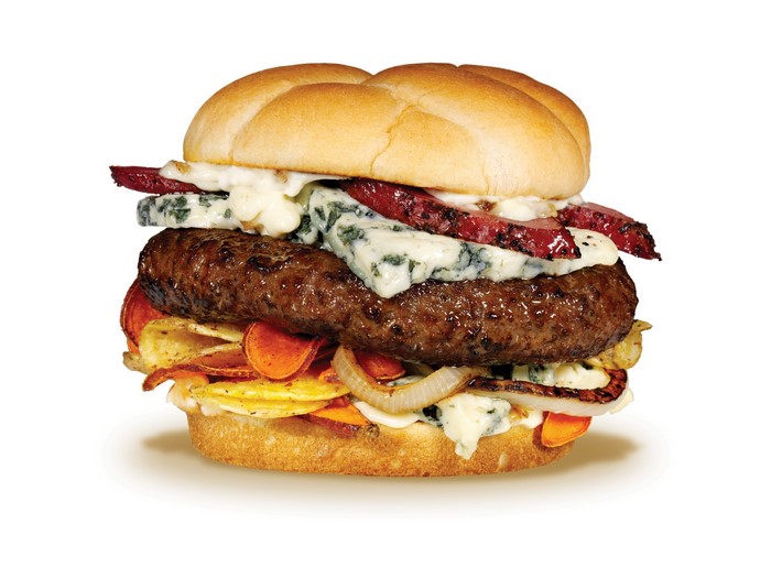 Gourmet burger with blue cheese and chips