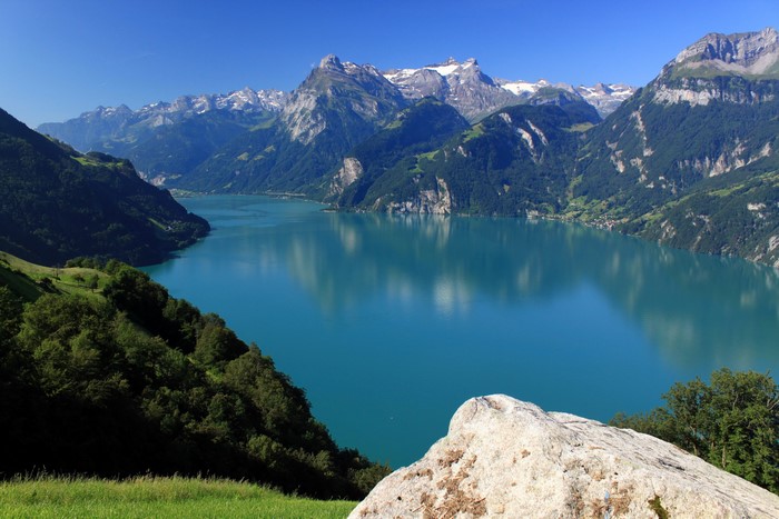 Lake surrounded by mountains in Morschach, Switzerland
