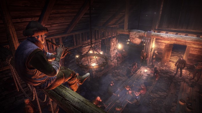 A man plays a flute in a tavern in The Witcher 3: Wild Hunt