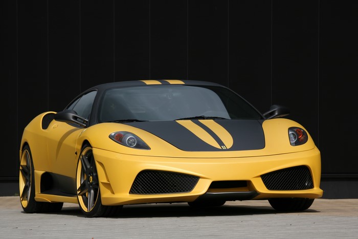 Yellow Ferrari F430 Edizione 747 with racing stripes
