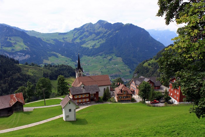 Village with church in Nidwalden Oberdorf, Switzerland