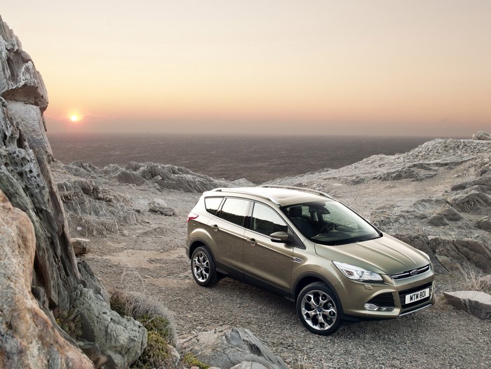 2013 Ford Kuga on rocky terrain at sunset