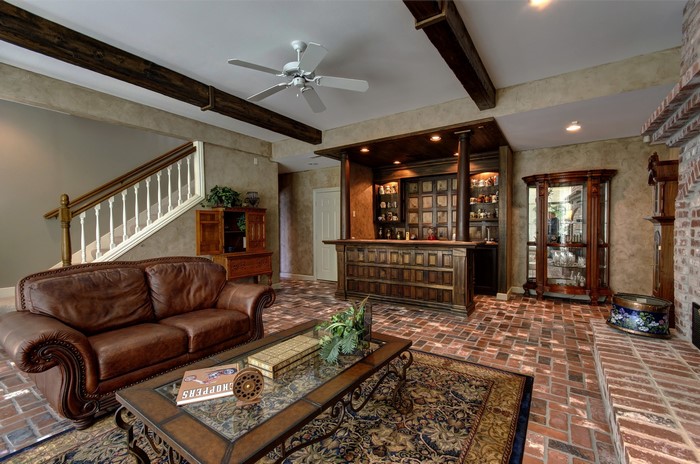 Interior of a living room with a bar and sofa