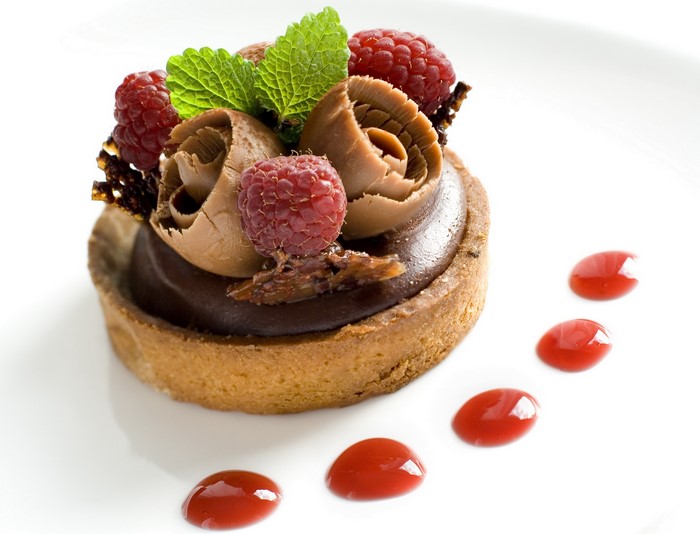 Chocolate tart with raspberries and mint