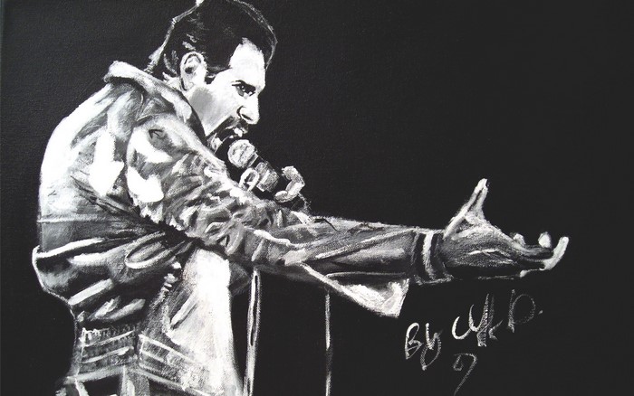 Freddie Mercury performing on stage
