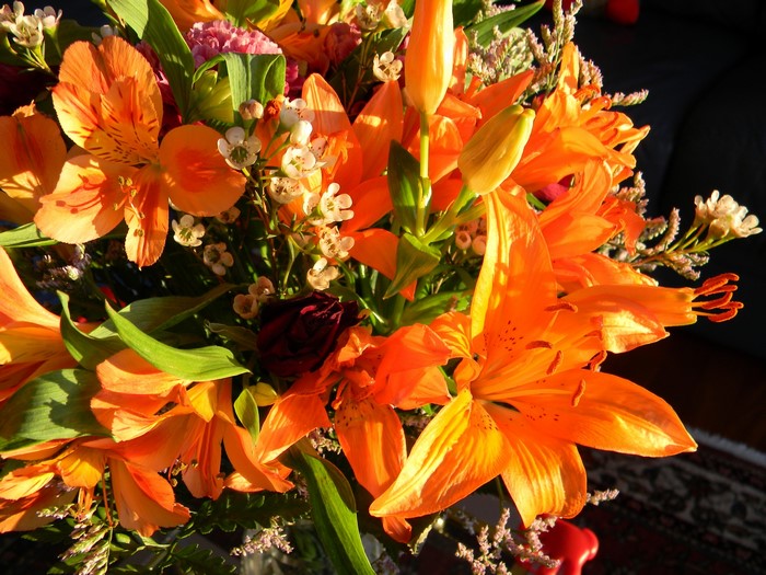 Orange lilies and alstroemeria flowers