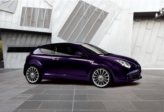 Violet Alfa Romeo MiTo 0.9 TwinAir parked outside modern building
