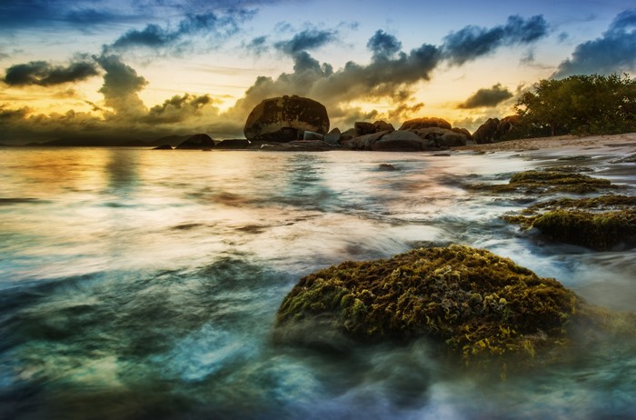 Rocky Coastline at Sunset with Dramatic Clouds