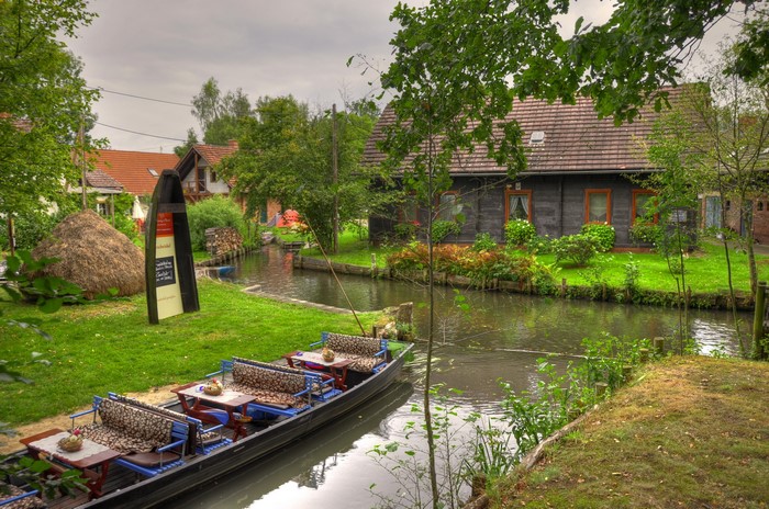Boat tour on a canal in Lubbenau, Brandenburg, Germany