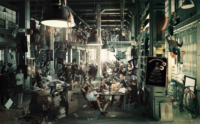 People celebrating Christmas in a busy office