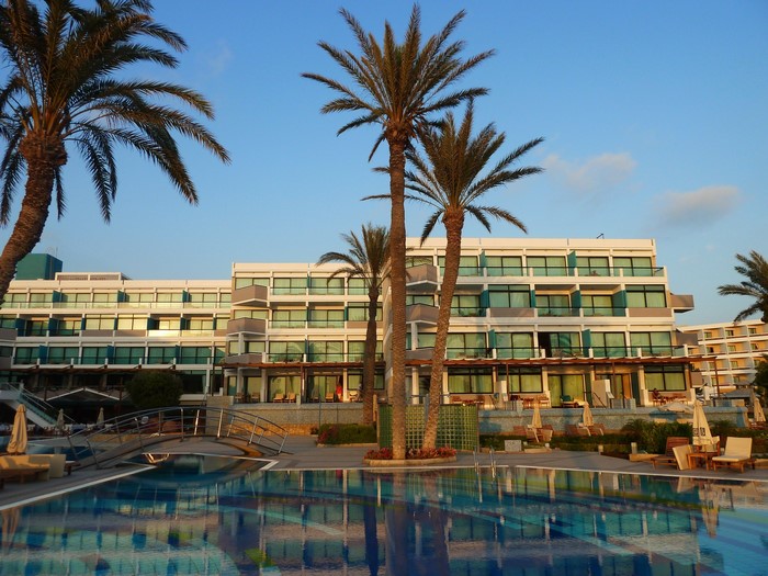 Resort with pools and palm trees in Saloniki, Cyprus