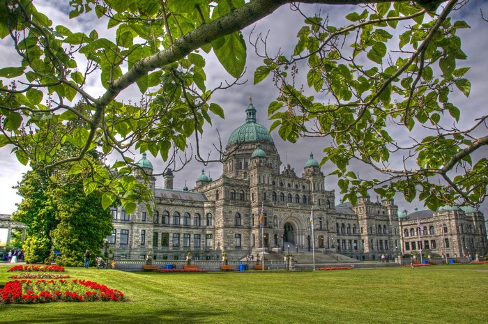Victoria Parliament Building with Trees and Flowers