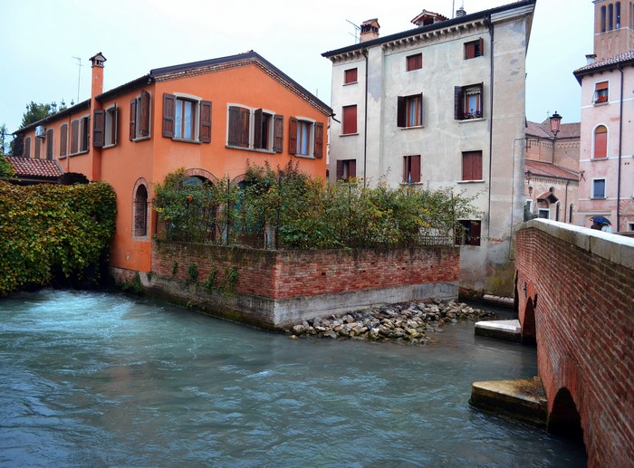 Houses along a canal in Treviso, Italy