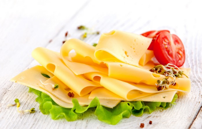 Cheese slices with lettuce and tomato
