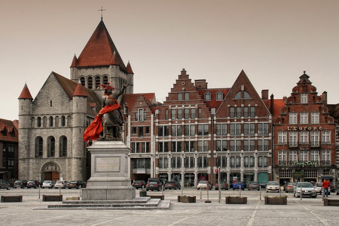 Statue in front of historic buildings in Tournai, Belgium