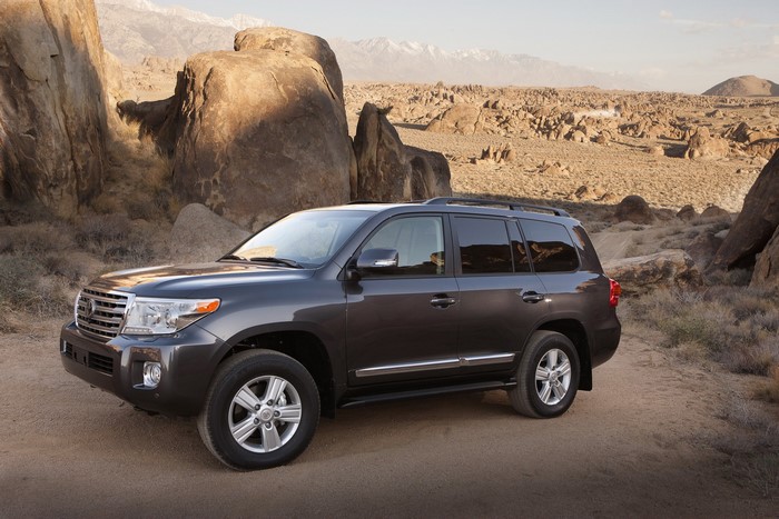 2013 Toyota Land Cruiser in a rocky desert landscape