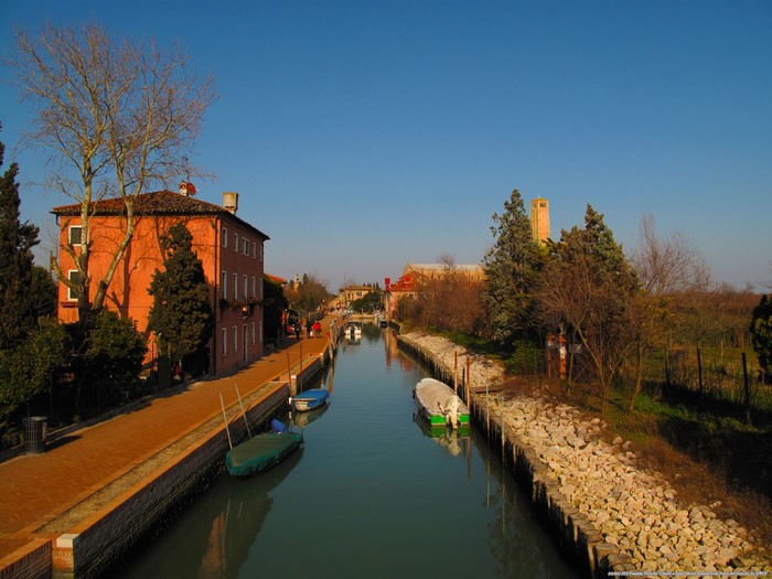 Canal in Italy with Buildings and Boats