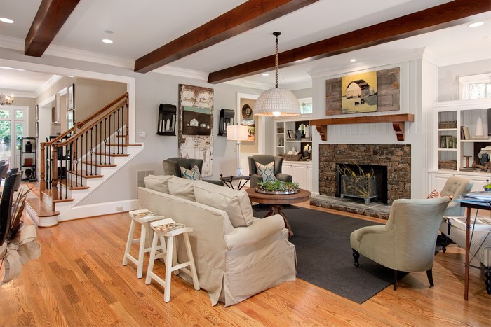 Living room with fireplace and stairs
