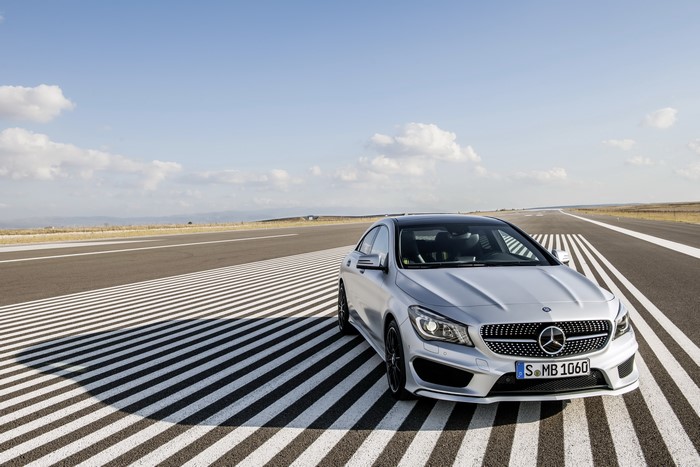 Silver 2013 Mercedes-Benz CLA250 Edition on asphalt runway