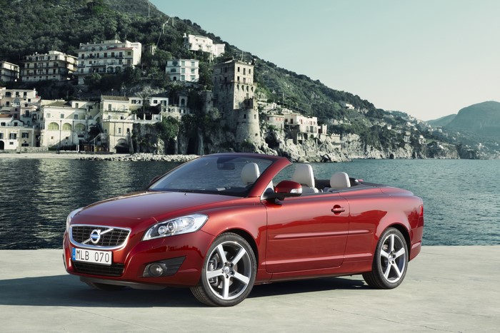 Red Volvo C70 Cabriolet parked by the sea