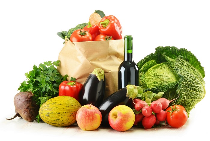 Vegetables and Wine in a Paper Bag