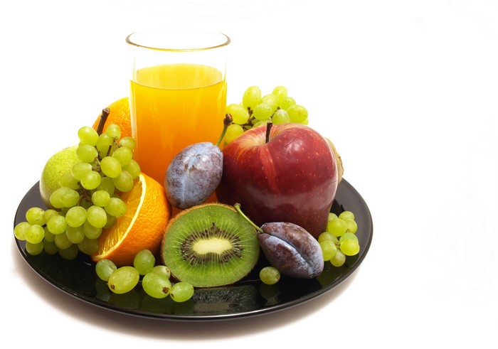 Fruit platter with juice and grapes