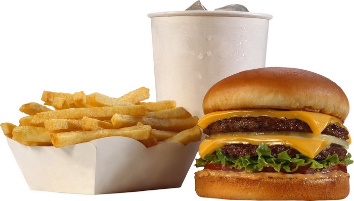 Double cheeseburger with french fries and a drink