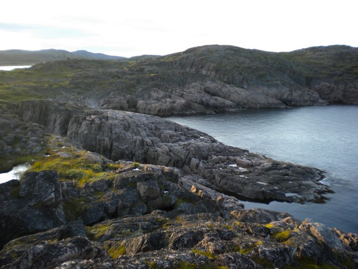 Rocky Coastline with Ocean and Hills