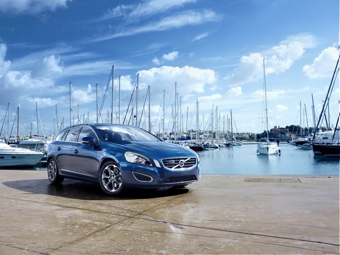 Blue 2011 Volvo V60 parked at a marina