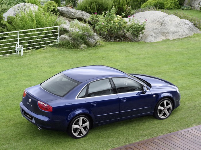 Blue 2009 Seat Exeo on a green lawn